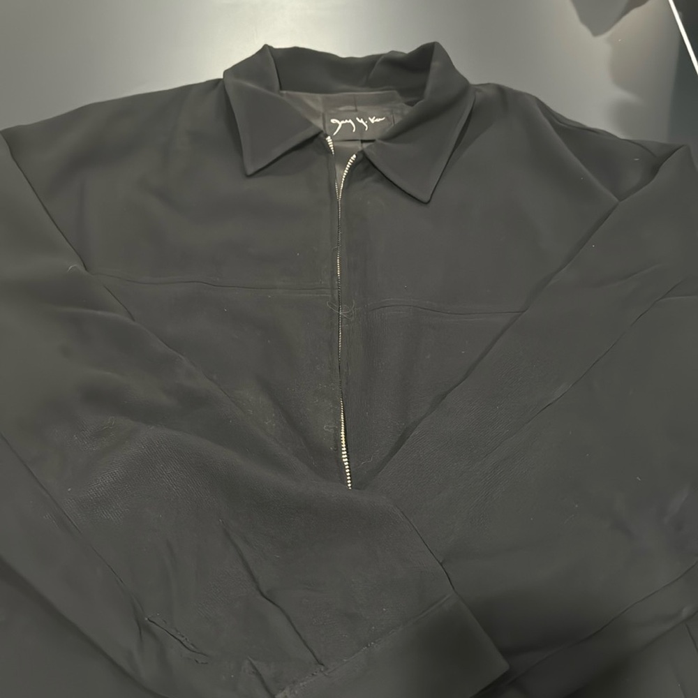 Jay Y. Ka black jacket